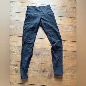 Lululmeon black wunder under leggings with mesh cut outs full length